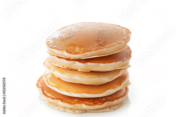Fototapeta a stack of pancakes with syrup on top