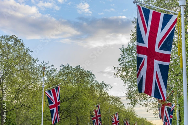 Fototapeta Lines of union jack flags hanging along the Mall, London