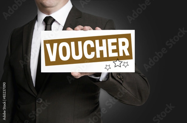 Obraz Voucher schild wird von Geschäftsmann  gehalten