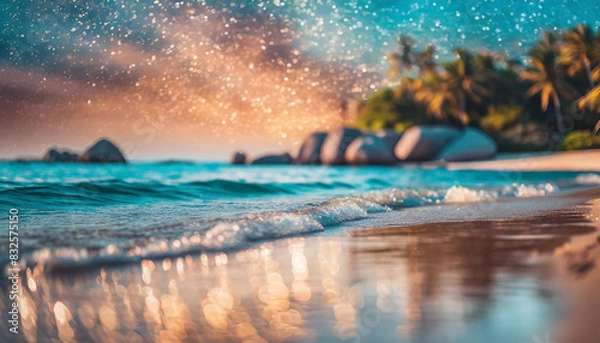 Fototapeta Blurry beach scene with sun reflections on waves, capturing serene tropical summer vibes