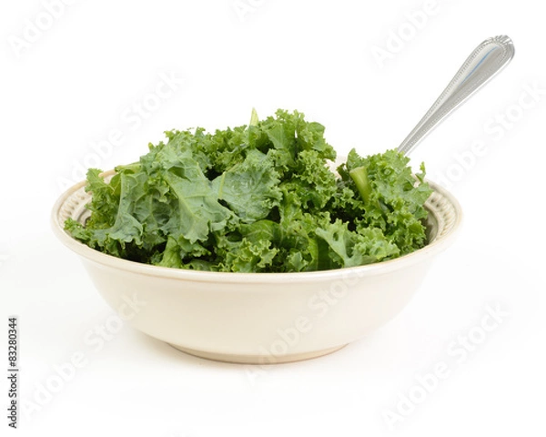Obraz Chopped kale salad with fork