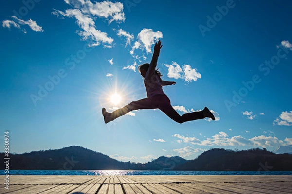 Obraz Girl jumping in the sun