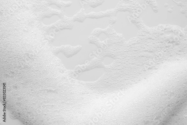 Fototapeta Abstract white soap foam bubbles texture on white background