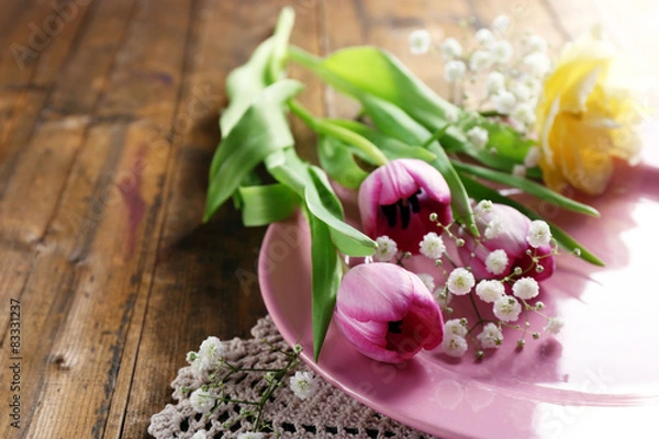 Fototapeta Tableware with flowers on table close up