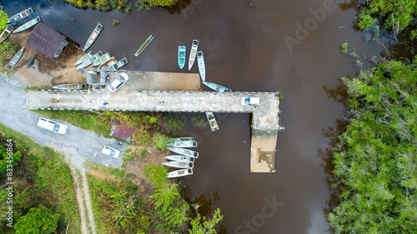 Fototapeta drone view from above you can see the pier and the river
