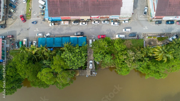 Fototapeta drone view from above the river and town
