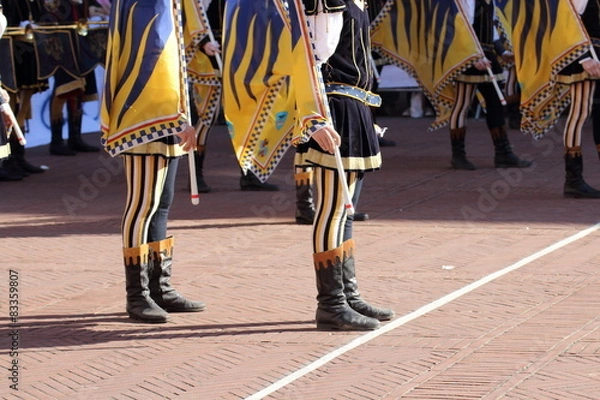 Fototapeta competitions of the flag wavers and the parade of the districts