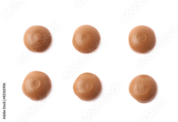 Fototapeta Toffee chewing candies isolated