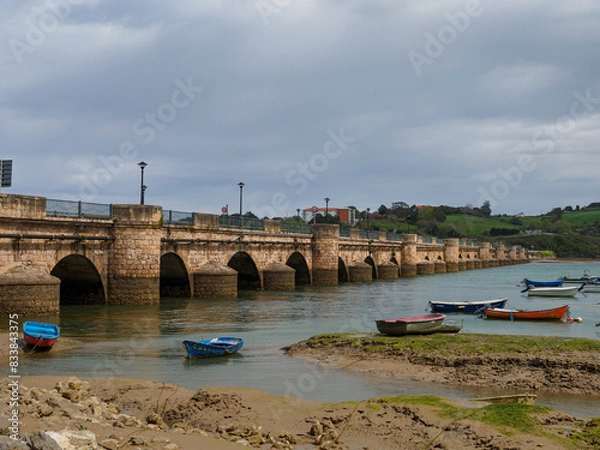Obraz Boats stranded in the sand at low tide (San Vicente de la Barquera)