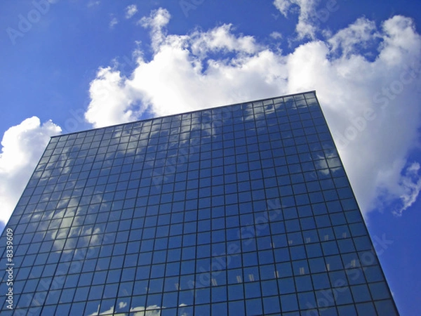 Fototapeta Skyscraper and clouds