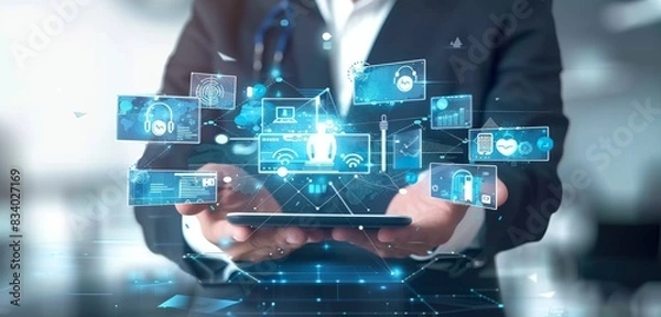 Fototapeta A businessman holding multiple digital devices with medical icons floating above, representing the use of AI in healthcare marketing and online clinic services.