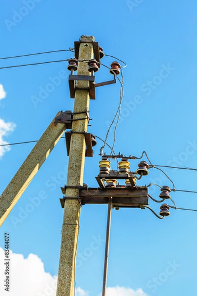 Fototapeta Electrical post with power line cables