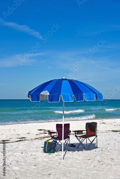 Fototapeta Beach Umbrella with Chairs