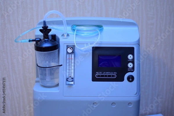 Fototapeta the oxygen concentrator or oxygen generator is designed for oxygen therapy in medical institutions and individual use at home. Allows you to get high-concentration oxygen by filtering the surrounding