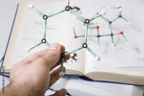 Obraz Hand holding molecular model