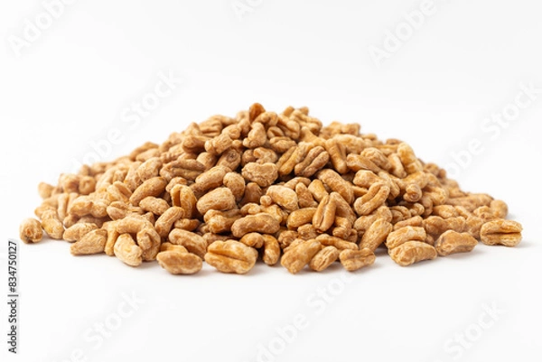 Fototapeta Roasted kamut on white background