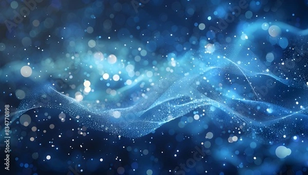 Fototapeta Abstract blue glowing particles background with a bokeh effect
