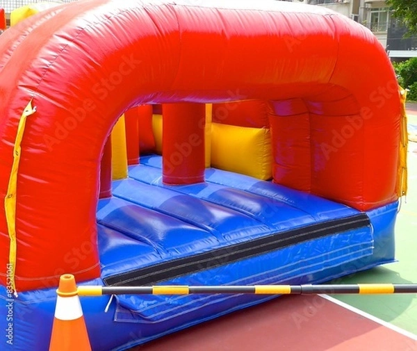 Obraz Inflatable bouncy castle in school
