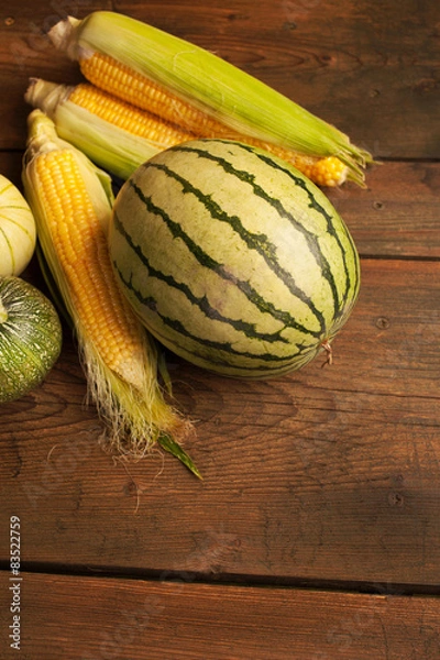 Fototapeta Fruits and vegetables at a picnic table background