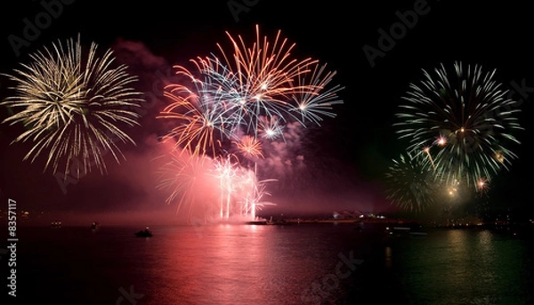 Fototapeta Fireworks with reflections