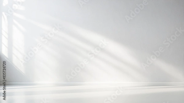 Obraz Minimalistic light background with blurred foliage shadow on white wall