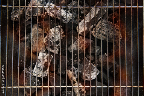 Fototapeta Barbecue Fire Grill top view, isolated on Black Background.