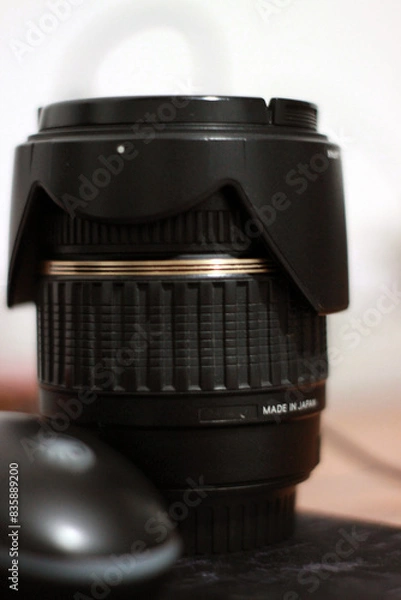 Obraz camera lens on the table