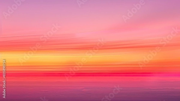 Obraz A beautiful gradient background transitioning from deep orange to soft pink.