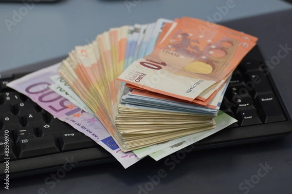 Fototapeta Money on keyboard