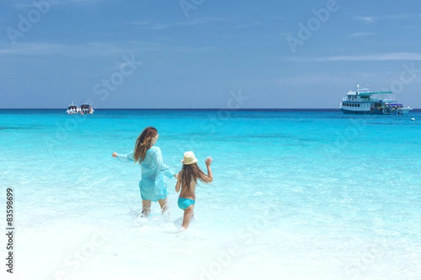 Fototapeta Family on a beach