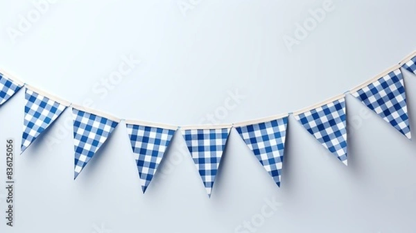 Obraz Blue and white gingham bunting banner hanging on a white wall.