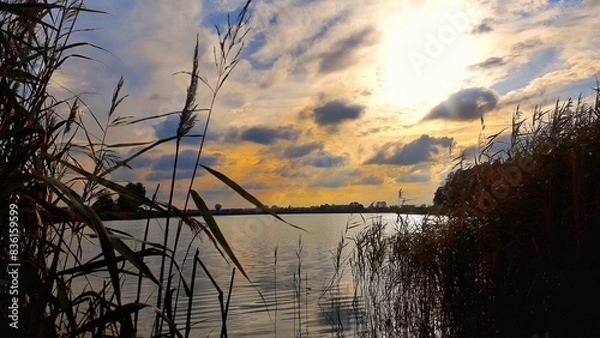 Fototapeta sunset over lake