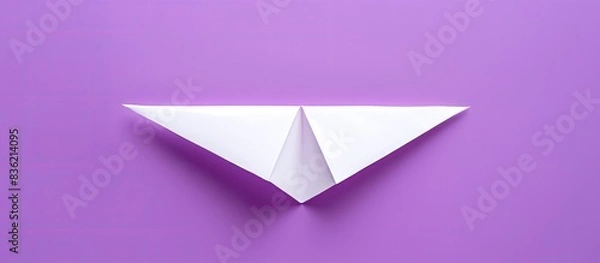 Obraz Paper origami of a purple plane against a plain white backdrop with ample space for additional imagery.