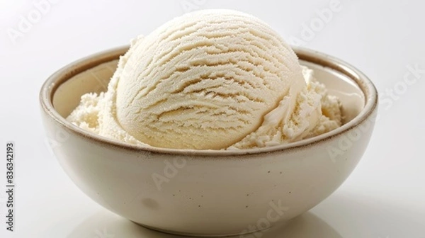 Fototapeta A single scoop of ice cream in a plain bowl, white background,