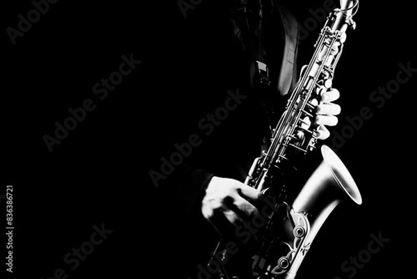 Fototapeta Saxophone player Saxophonist playing sax alto