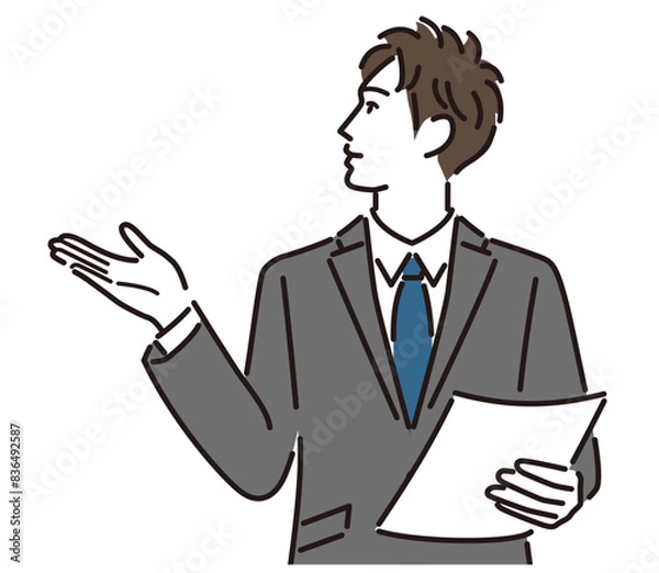 Fototapeta 資料を説明するスーツの男性