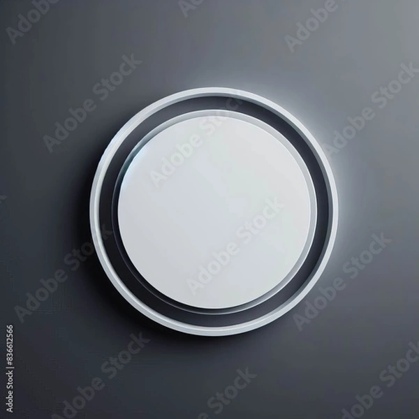 Fototapeta A single white round circle  with a smooth shell sits alone on a grey background