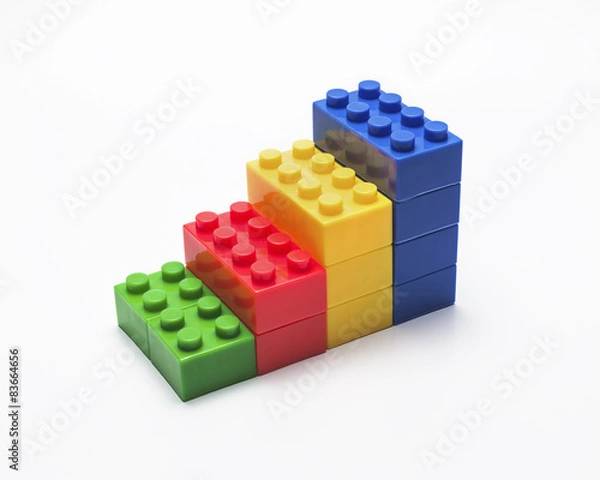 Fototapeta Colorful stacked toy building blocks for kids.