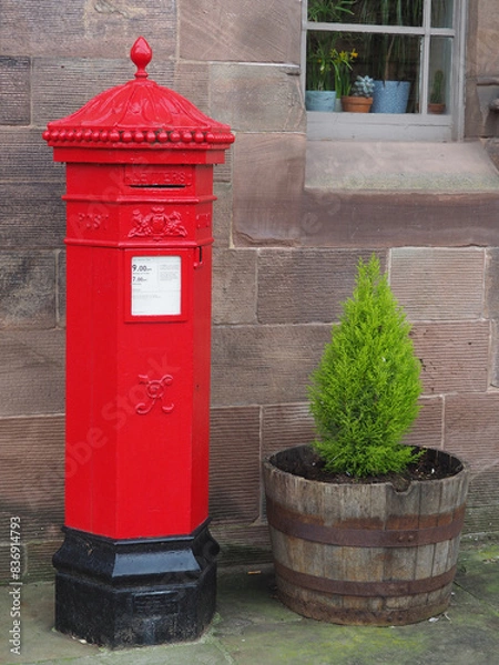 Obraz traditional bright red cast iron British Victorian octagonal post or mail box