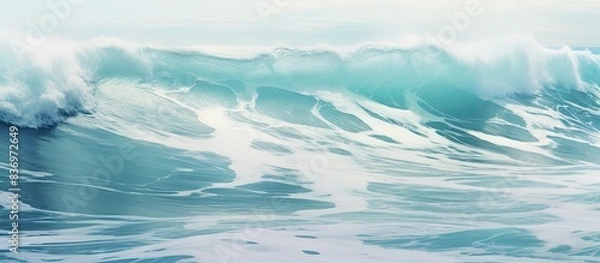 Fototapeta Stormy ocean waves along the late summer shores of the western Portuguese coast, with a serene copy space image.