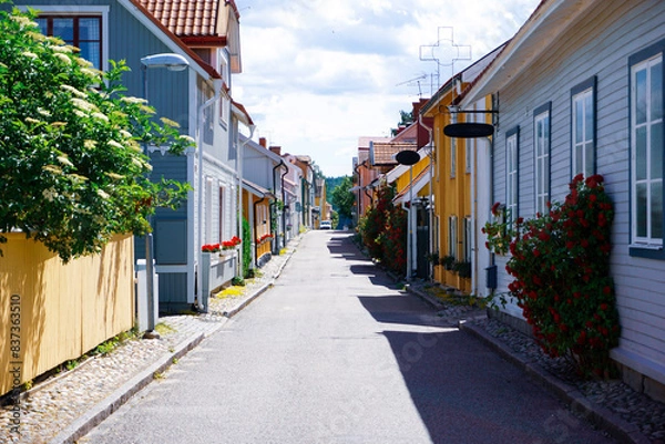 Obraz A empty street among buildings