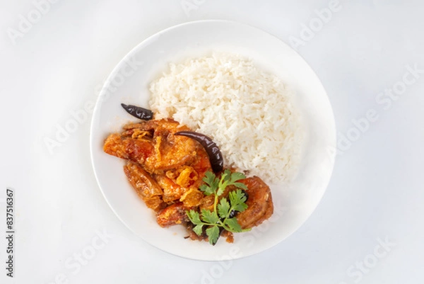Fototapeta Shrimp with sauce over rice isolated on white background