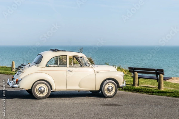 Fototapeta Morris Minor at the seaside.