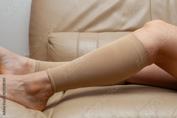 Fototapeta Compression stockings that correct swelling in the calves