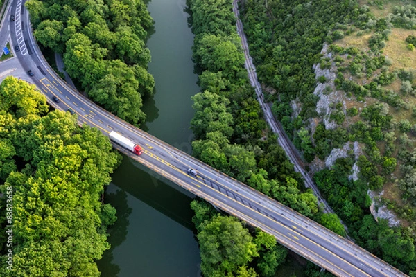 Fototapeta Aerial view of the bridge and the road over the river Pinios in
