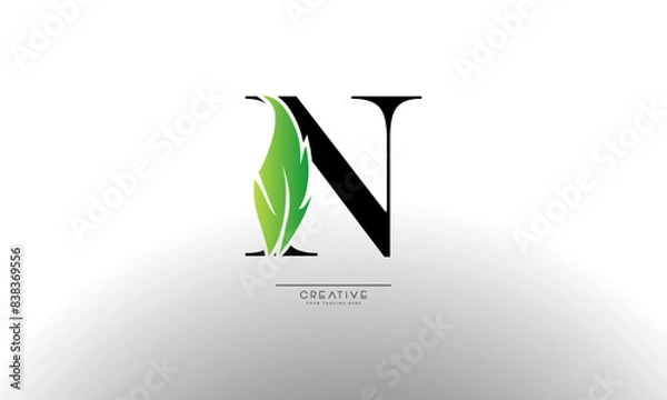Fototapeta Letter N eco leaf logo icon design template elements. Vector color sign
