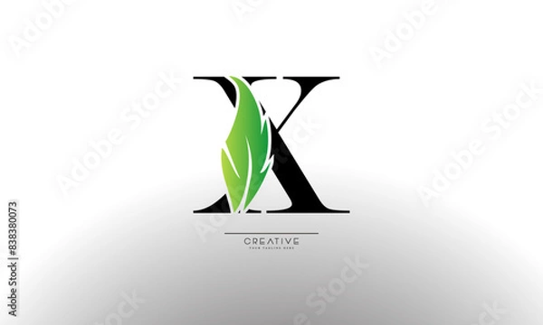 Fototapeta Letter X eco leaf logo icon design template elements. Vector color sign
