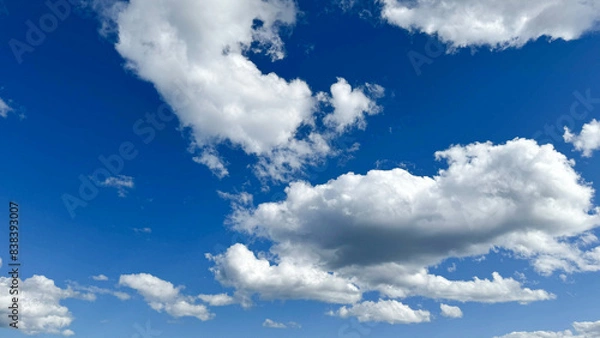 Obraz Clear blue sky and white clouds background