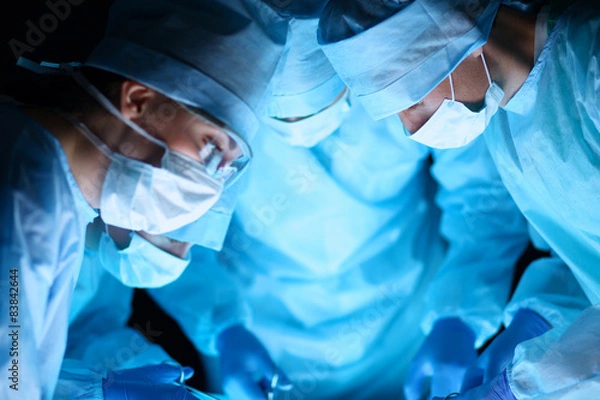 Fototapeta Surgery team in the operating room