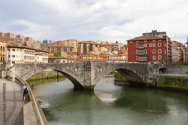Obraz San Antón Bridge medievil  in the centre of Bilbao.  It spans the Estuary of Bilbao, linking the neighborhoods of Bilbao La Vieja and Casco Viejo. It is the oldest bridge in the city built in 1871.